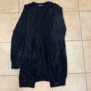 Fuzzy, black cardigan